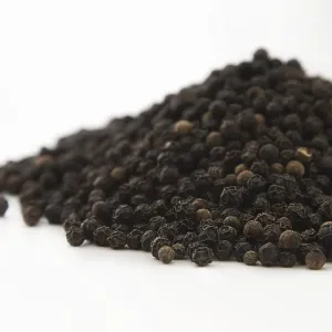 Close up view of a mountain of black pepper