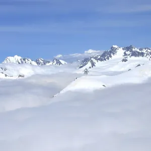 Cloud gathers around the alpine peaks of the Southern Alps