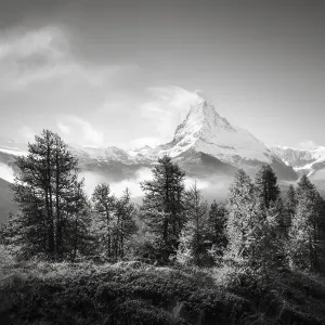 Clouds over the Swiss Matterhorn in black and white Clouds over the Swiss Matterhorn in black and white