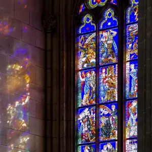 Detail of a colorful church window inside the Saint Vitus Cathedral in Prague Detail of a colorful church window inside the Saint Vitus Cathedral in Prague