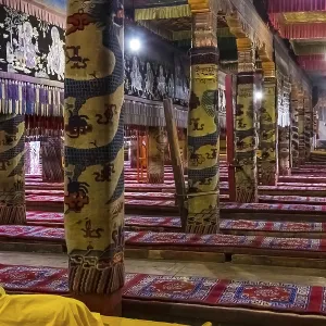 A colorfully decorated prayer hall with carpets at Ta'er Monastery west of Xining
