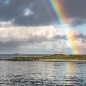 Colourful rainbow over the sea