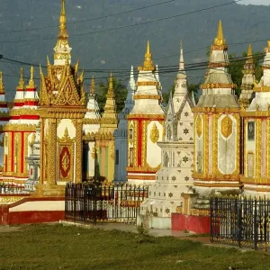 Many colourful stupas monastery Wat Tham Fai Pakse Laos