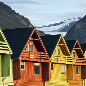Colourful wooden houses in the settlement of Longyearbyen in summer Colourful wooden houses in the settlement of Longyearbyen in summer