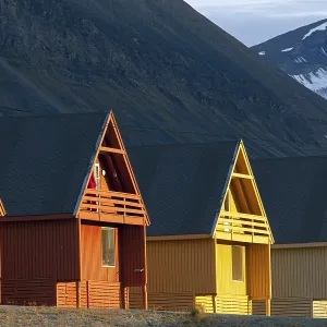 Colourful wooden houses in the settlement of Longyearbyen in summer