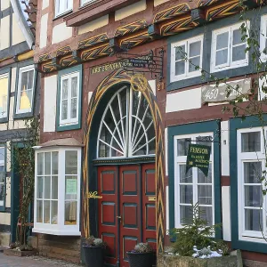 Colourfully painted facade of a 16th century half-timbered house in BackerstraBe Colourfully painted facade of a 16th century half-timbered house in BackerstraBe
