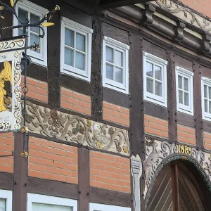 Colourfully painted frame house Print, Stadthagen, Germany