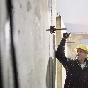 Construction worker at building site Construction worker at building site