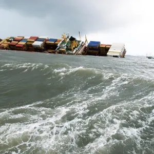 Container ship chitra tilted dangerously colliding in sea Container ship chitra tilted dangerously colliding in sea