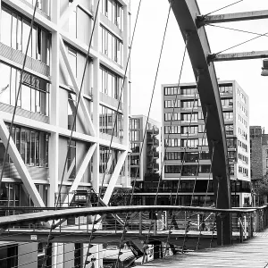 The contrast between the modern bridge and the historic urban environment The contrast between the modern bridge and the historic urban environment
