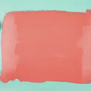 Coral paint can paintbrush with painted teal background Coral paint can paintbrush with painted teal background