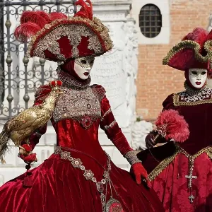 Costumed women, traditional Venetian masks Costumed women, traditional Venetian masks