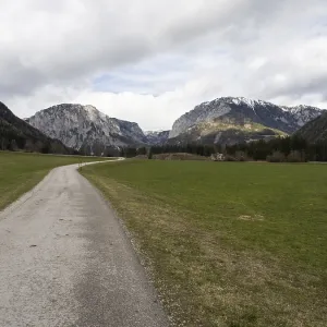 Country road in front of mountain panorama
