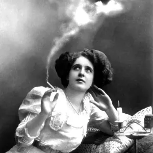 Couple, early montage, woman smokes and beloved man appears in cigarette smoke Couple, early montage, woman smokes and beloved man appears in cigarette smoke