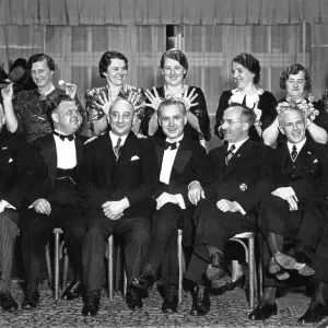 Couples, group photo, nine men and their wives Couples, group photo, nine men and their wives