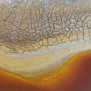 Cracked earth at the bank of the Rio Tinto (Red river)