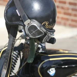 Crash helmet with goggles on an NSU motorbike Crash helmet with goggles on an NSU motorbike