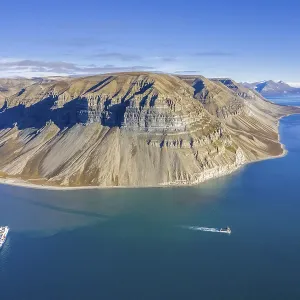 Cruise ship of Iceland ProCruises and Skansbukta in the outer Billefjorden Cruise ship of Iceland ProCruises and Skansbukta in the outer Billefjorden