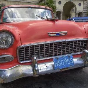 For Cuba typical old US classic car Chevrolet with weathered red paint For Cuba typical old US classic car Chevrolet with weathered red paint