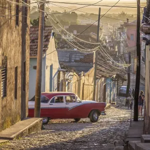 Cuban street with oldtimer in Trinidad, Cuba Cuban street with oldtimer in Trinidad, Cuba