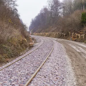 Curvy train tracks run through a quiet Curvy train tracks run through a quiet