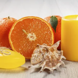 Cut orange with two whole oranges Cut orange with two whole oranges