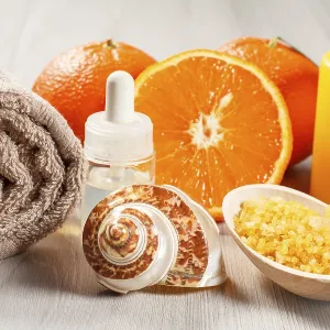 Cut orange with two whole oranges Cut orange with two whole oranges