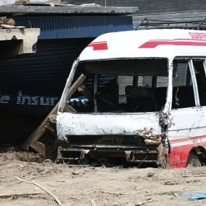 Damaged bus stuck in mud at choglamsar due to flashflood Damaged bus stuck in mud at choglamsar due to flashflood