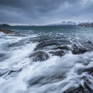 Dark clouds over the stormy sea