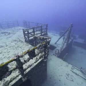 Deck and steel stairs of an abandoned shipwreck under water