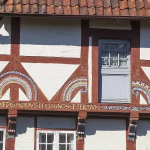 Decorated beams on a historic half-timbered house in Lune Abbey Decorated beams on a historic half-timbered house in Lune Abbey