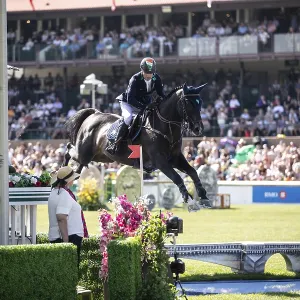 Denis Lynch of Ireland and riding Vistogrand compete in the first round of the 1 Denis Lynch of Ireland and riding Vistogrand compete in the first round of the 1