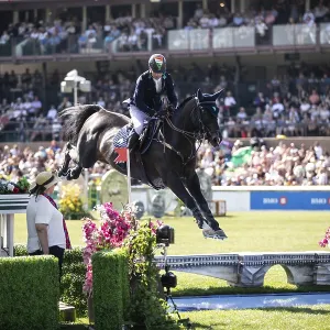 Denis Lynch of Ireland and riding Vistogrand compete in the first round of the 1 Denis Lynch of Ireland and riding Vistogrand compete in the first round of the 1