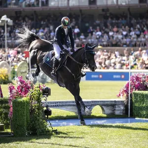 Denis Lynch of Ireland and riding Vistogrand compete in the first round of the 1 Denis Lynch of Ireland and riding Vistogrand compete in the first round of the 1
