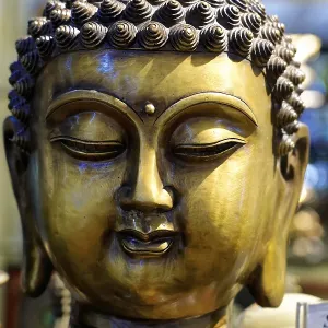 Detailed bronze sculpture of Buddha's head Detailed bronze sculpture of Buddha's head