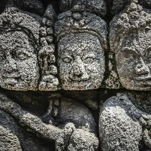 Details of sculptures and reliefs on the walls of the Borobudur temple in Java Details of sculptures and reliefs on the walls of the Borobudur temple in Java