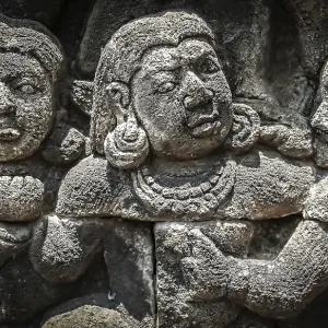 Details of sculptures and reliefs on the walls of the Borobudur temple in Java Details of sculptures and reliefs on the walls of the Borobudur temple in Java