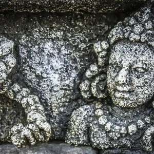 Details of sculptures and reliefs on the walls of the Borobudur temple in Java