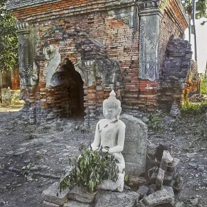 Dilapidated temple with Buddha figure in Amarapura