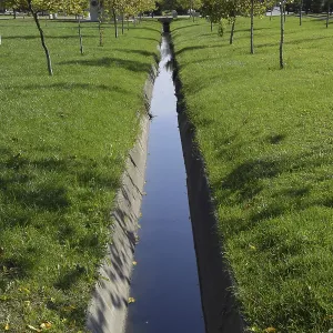 Drain drain for water. Autumn in the park Drain drain for water. Autumn in the park