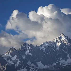 Dramatic cape atmosphere over the Aiguille du Moine and Mont Blanc