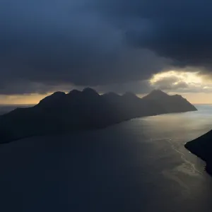 Dramatic mood lighting over the islands of Kalsoy and Kunoy