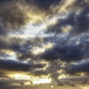 Dramatic sky during sunset, mountains in silhouette Dramatic sky during sunset, mountains in silhouette