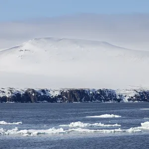 Drift ice, sea ice, sea, mountain range Drift ice, sea ice, sea, mountain range