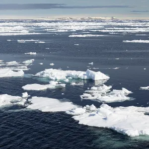 Drift ice, sea ice, sea, mountain range Drift ice, sea ice, sea, mountain range