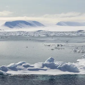Drift ice, sea ice, sea, mountain range Drift ice, sea ice, sea, mountain range