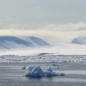 Drift ice, sea ice, sea, mountain range Drift ice, sea ice, sea, mountain range