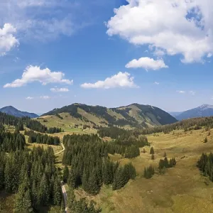 Drone shot of the Illingeralm with a view of the Pillsteinhoehe and Zwoelferhorn