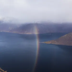 Drone shot, rainbow over the village of Fjordgard Drone shot, rainbow over the village of Fjordgard