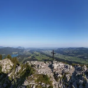Drone shot, summit cross on the Schober with a view of Mondsee and Fuschlsee Drone shot, summit cross on the Schober with a view of Mondsee and Fuschlsee
